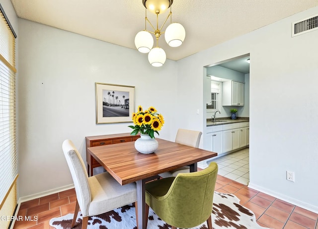 8520 Paddlefoot Ln, El Paso, TX 79907 - dining room with baseboards and light tile patterned floors