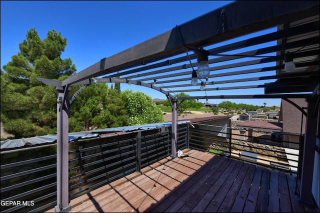 wooden terrace featuring a pergola