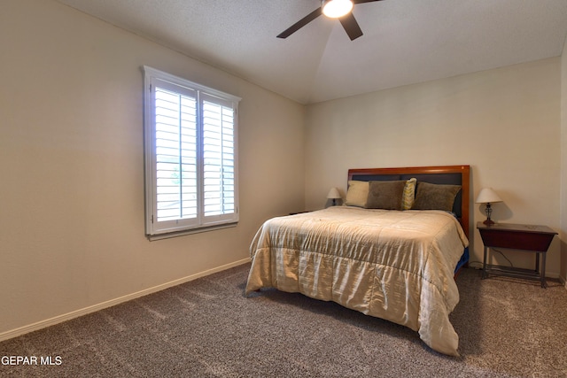 carpeted bedroom with baseboards and a ceiling fan