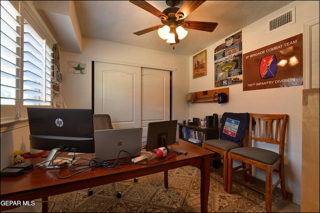 home office featuring ceiling fan