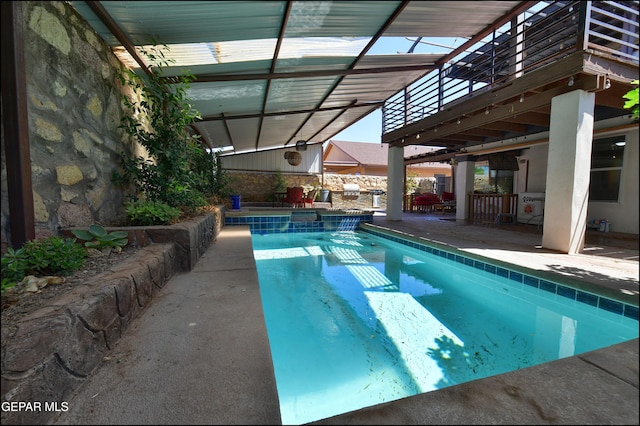 view of pool with a patio area