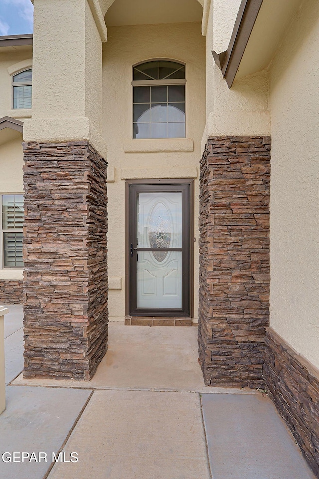 3136 Hawk Point Pl, El Paso, TX 79938 - property entrance with stone siding and stucco siding