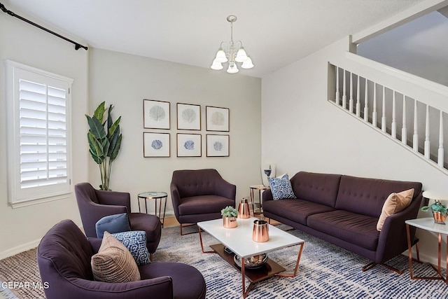 3136 Hawk Point Pl, El Paso, TX 79938 - living area with a chandelier, baseboards, and stairway