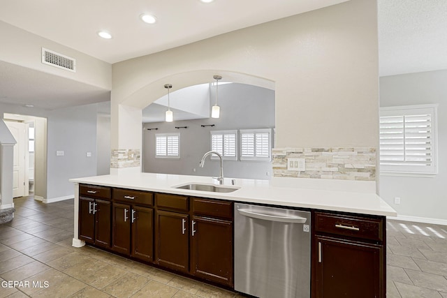 3136 Hawk Point Pl, El Paso, TX 79938 - kitchen featuring stainless steel dishwasher, a sink, decorative backsplash, light countertops, and recessed lighting