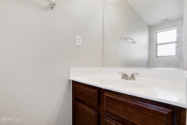 3136 Hawk Point Pl, El Paso, TX 79938 - bathroom featuring vanity and a textured wall