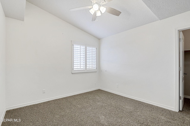 3136 Hawk Point Pl, El Paso, TX 79938 - unfurnished bedroom featuring carpet, lofted ceiling, baseboards, a textured ceiling, and a ceiling fan