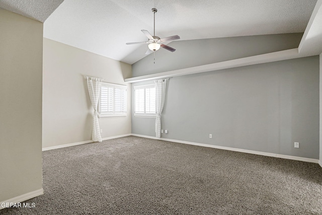 3136 Hawk Point Pl, El Paso, TX 79938 - spare room featuring a ceiling fan, carpet, lofted ceiling, baseboards, and a textured ceiling