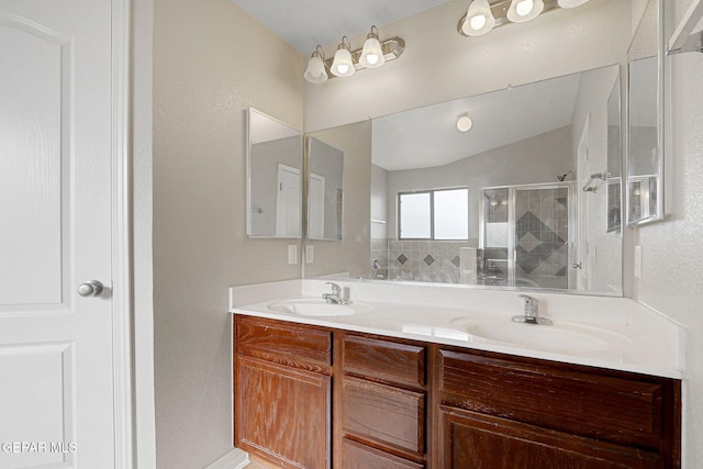3136 Hawk Point Pl, El Paso, TX 79938 - full bathroom with a shower stall and double vanity