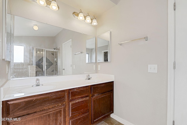 3136 Hawk Point Pl, El Paso, TX 79938 - full bath featuring a shower stall, double vanity, and tile patterned floors