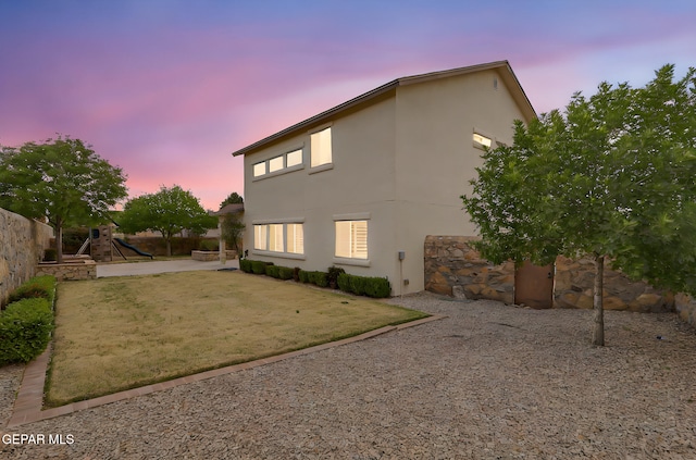 3136 Hawk Point Pl, El Paso, TX 79938 - rear view of house featuring stucco siding and a patio