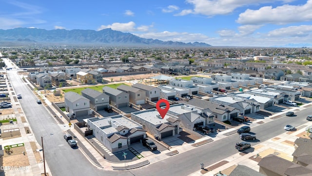 aerial perspective of suburban area with mountains