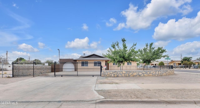 589 Gallagher St, El Paso, TX 79915 - view of front of property featuring a fenced front yard and driveway