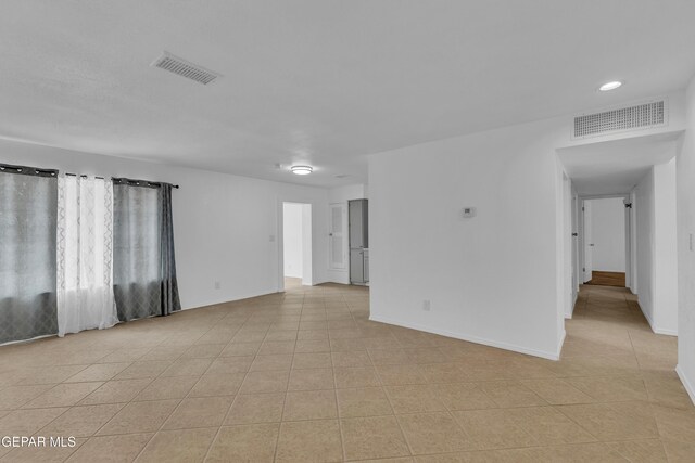 589 Gallagher St, El Paso, TX 79915 - unfurnished room featuring light tile patterned floors and baseboards