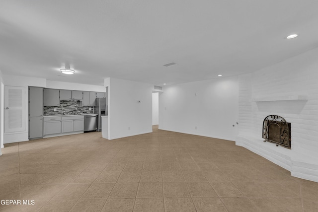 589 Gallagher St, El Paso, TX 79915 - unfurnished living room featuring a fireplace, recessed lighting, and baseboards