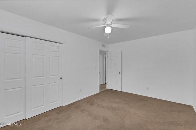 589 Gallagher St, El Paso, TX 79915 - unfurnished bedroom with carpet, baseboards, a closet, and ceiling fan