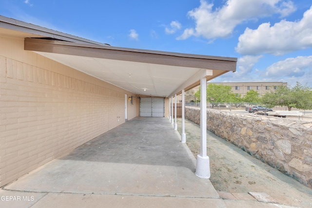 589 Gallagher St, El Paso, TX 79915 - view of patio featuring a carport