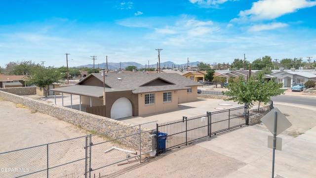 589 Gallagher St, El Paso, TX 79915 - view of front of home featuring a gate, fence, a residential view, a garage, and a shingled roof
