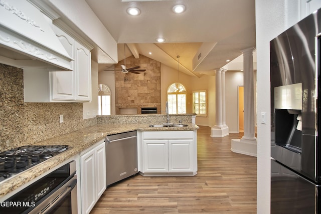 1483 Via Appia St, El Paso, TX 79912 - kitchen with appliances with stainless steel finishes, decorative columns, a ceiling fan, a sink, and recessed lighting