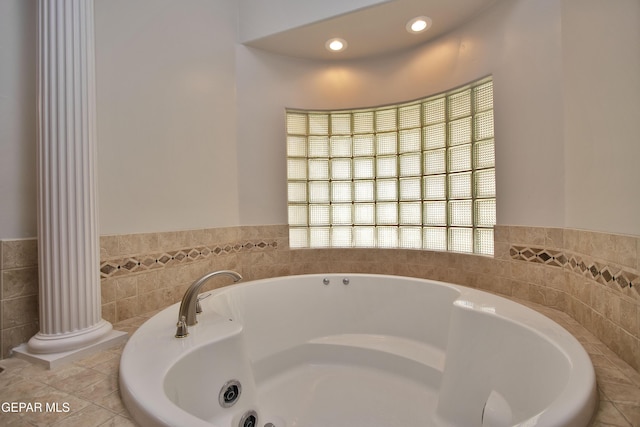 1483 Via Appia St, El Paso, TX 79912 - full bathroom featuring a garden tub, recessed lighting, and tile walls