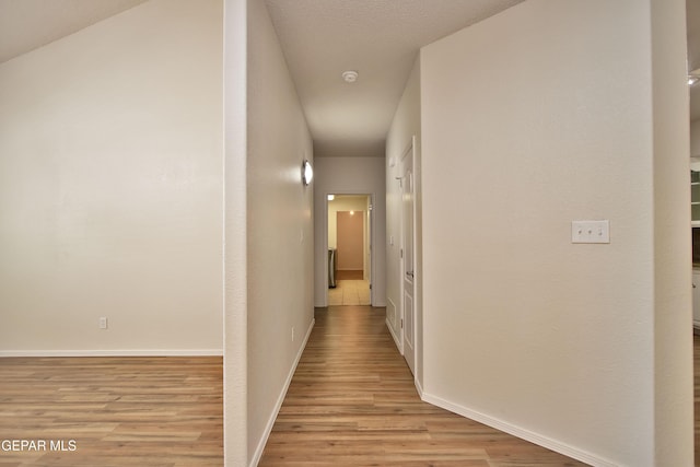 1483 Via Appia St, El Paso, TX 79912 - corridor featuring light wood-style flooring and baseboards