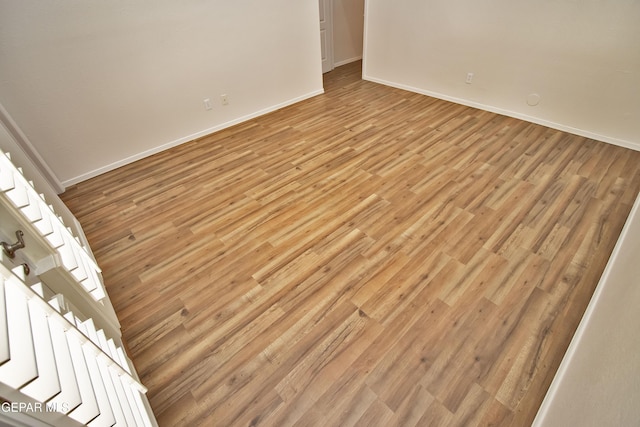 1483 Via Appia St, El Paso, TX 79912 - empty room with baseboards and light wood finished floors
