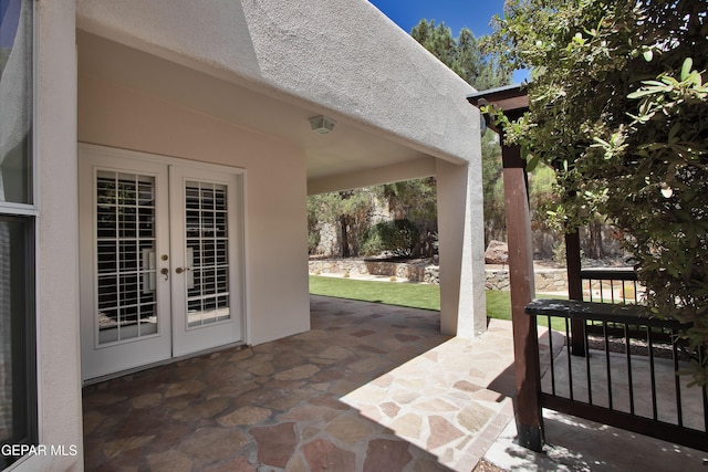 1483 Via Appia St, El Paso, TX 79912 - view of patio featuring french doors