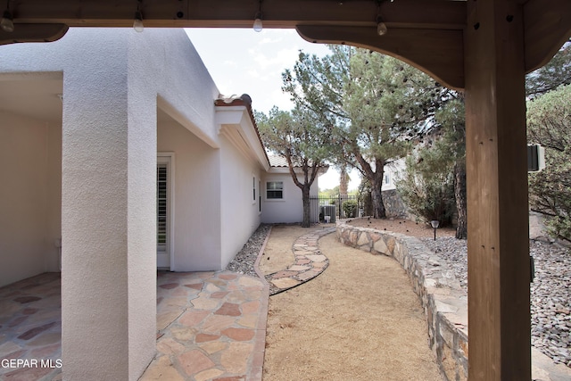 1483 Via Appia St, El Paso, TX 79912 - view of patio with central AC unit