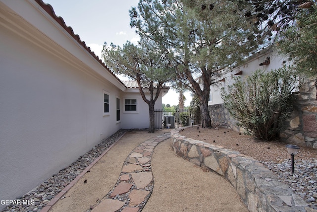 1483 Via Appia St, El Paso, TX 79912 - view of yard with central air condition unit