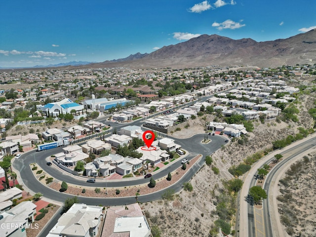 1483 Via Appia St, El Paso, TX 79912 - aerial perspective of suburban area featuring a mountainous background