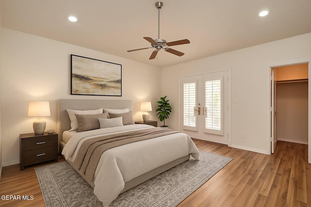 1483 Via Appia St, El Paso, TX 79912 - bedroom with access to exterior, baseboards, light wood-type flooring, and recessed lighting