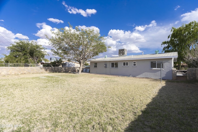 back of property with stucco siding