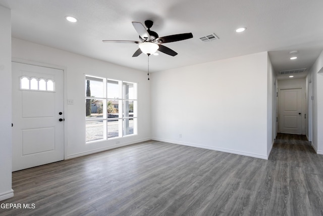 unfurnished living room with ceiling fan, wood finished floors, recessed lighting, and baseboards