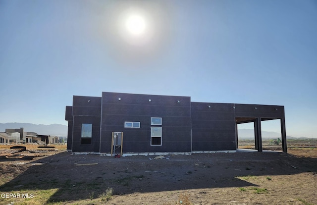 332 Rio Del Rancho Ct, El Paso, TX 79932 - rear view of property with a mountain view