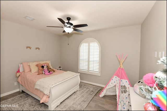 14844 Jack White Ave, El Paso, TX 79938 - bedroom featuring baseboards, ceiling fan, and wood finished floors