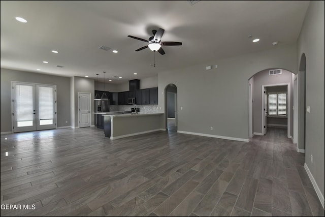 14844 Jack White Ave, El Paso, TX 79938 - unfurnished living room featuring a ceiling fan, dark wood-type flooring, recessed lighting, and baseboards