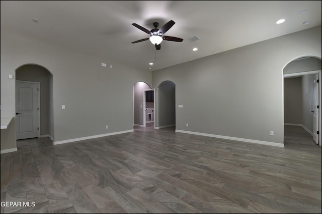 14844 Jack White Ave, El Paso, TX 79938 - unfurnished room with a ceiling fan, arched walkways, recessed lighting, and baseboards