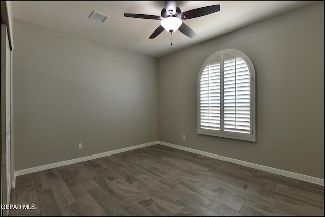 14844 Jack White Ave, El Paso, TX 79938 - empty room with ceiling fan, baseboards, and dark wood-style floors
