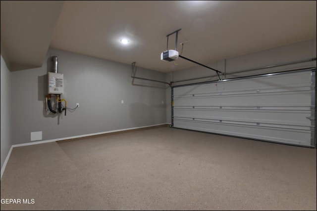 14844 Jack White Ave, El Paso, TX 79938 - garage with a garage door opener and baseboards