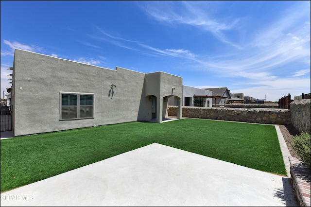 14844 Jack White Ave, El Paso, TX 79938 - rear view of house featuring a patio area and stucco siding