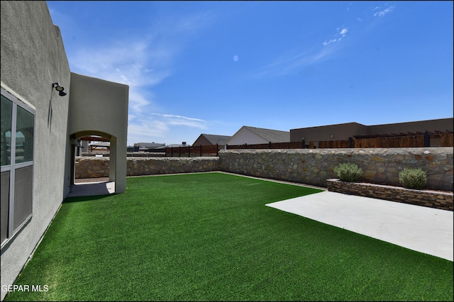 14844 Jack White Ave, El Paso, TX 79938 - view of yard featuring a patio area