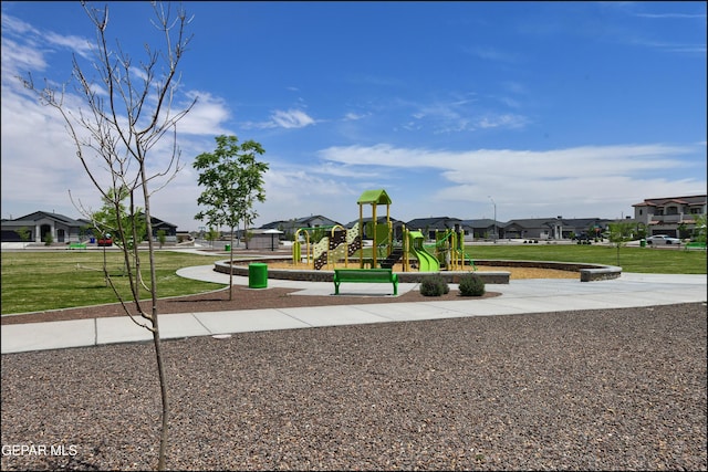 14844 Jack White Ave, El Paso, TX 79938 - view of community featuring a lawn and a residential view