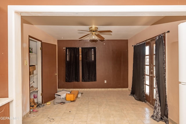 933 Duskin Dr, El Paso, TX 79907 - empty room with a ceiling fan and baseboards
