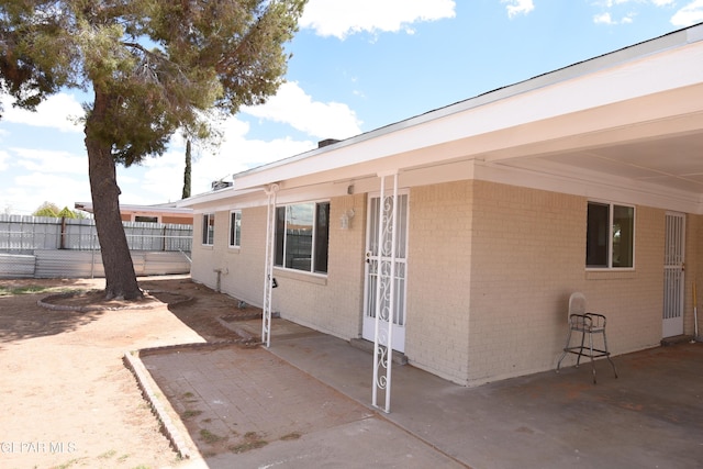 9207 Montgomery Dr, El Paso, TX 79924 - view of patio / terrace with fence and french doors