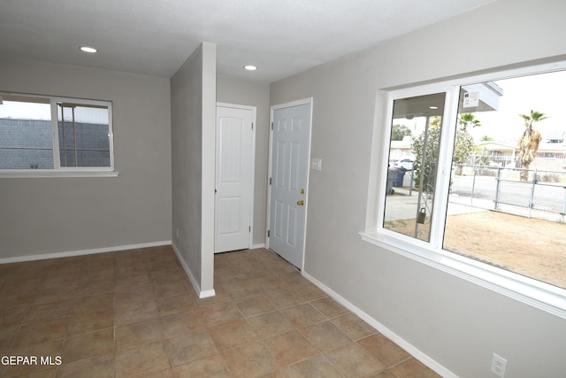 9207 Montgomery Dr, El Paso, TX 79924 - tiled foyer with baseboards and recessed lighting