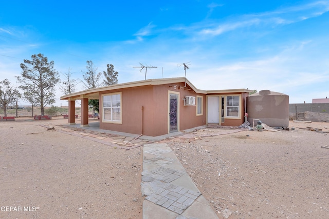 3571 Rebecca Ln, El Paso, TX 79938 - view of front facade featuring a wall mounted air conditioner