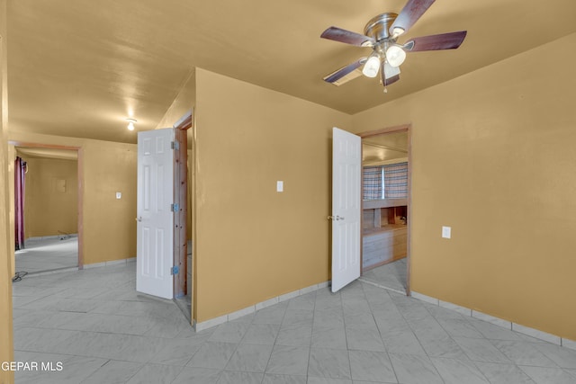 3571 Rebecca Ln, El Paso, TX 79938 - spare room with a ceiling fan and baseboards