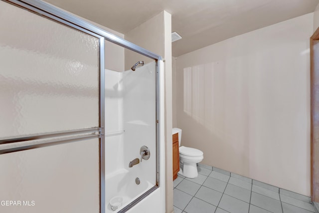 3571 Rebecca Ln, El Paso, TX 79938 - full bath featuring toilet, tile patterned flooring, and bath / shower combo with glass door