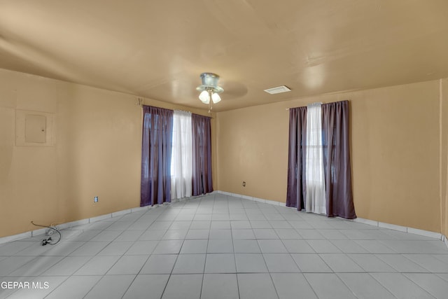 3571 Rebecca Ln, El Paso, TX 79938 - empty room featuring a ceiling fan, baseboards, and light tile patterned floors