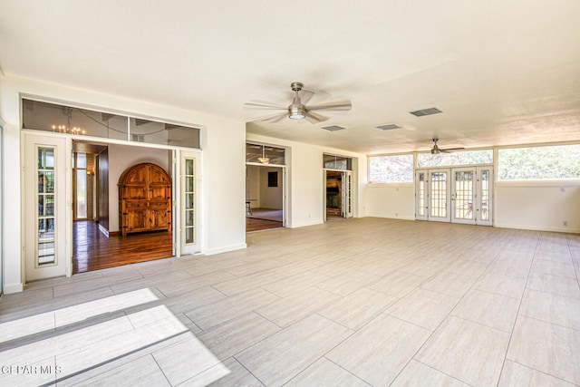 8024 Tonto Pl, El Paso, TX 79904 - unfurnished living room featuring ceiling fan and baseboards
