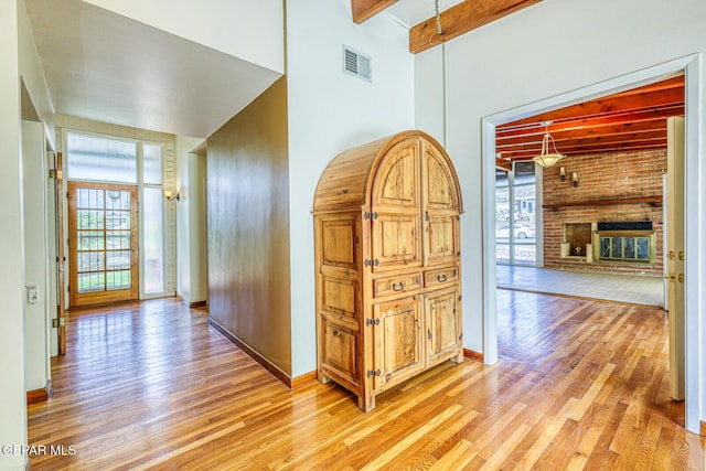 8024 Tonto Pl, El Paso, TX 79904 - hall featuring beamed ceiling and light wood-style flooring